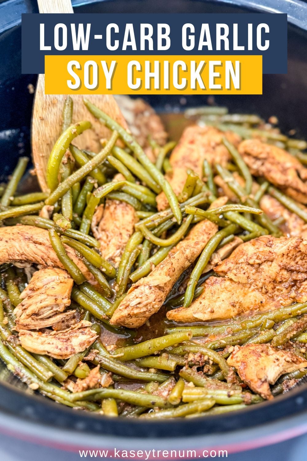 Close-up of keto honey garlic chicken and green beans in a slow cooker with a savory sauce.