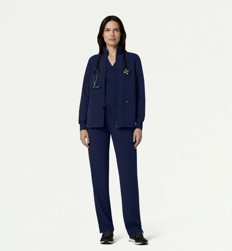 Jaanuu Womens 3 piece scrub set in navy stock image
